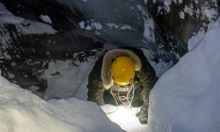 Annika climbing down the ice cave