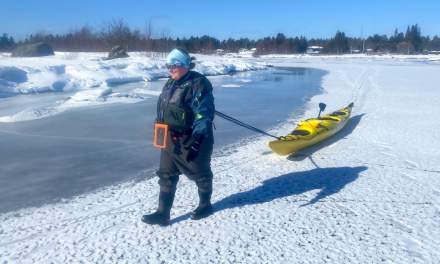 Dragging the kayak over the ice