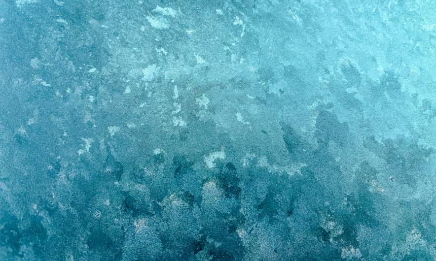 Frozen car window in the morning