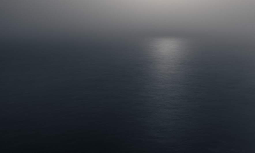 Open water under a full moon